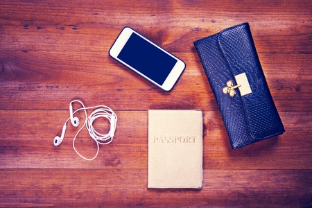 objects for travel isolated on a wooden background