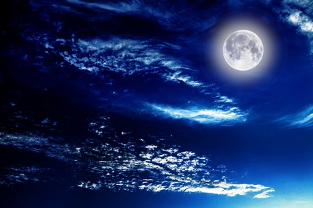 Night sky with stars and full moon backgroundの写真素材