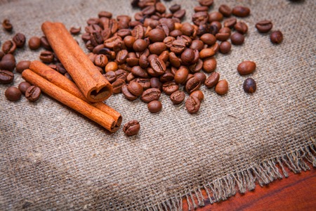 Coffee beans on wood backgroundの写真素材