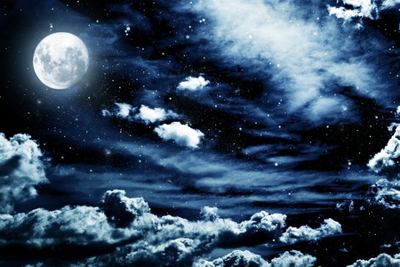 Night sky with stars and full moon backgroundの写真素材