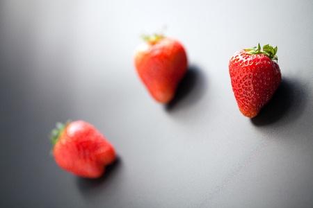 strawberry isolated on a black backgroundの写真素材