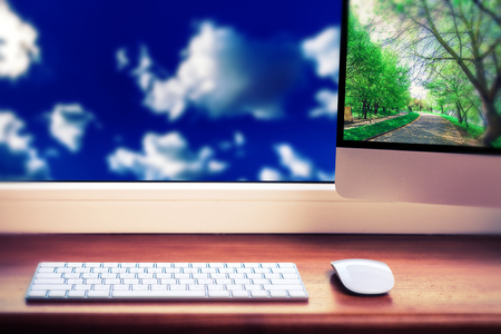 keyboard and mouse on a nature background