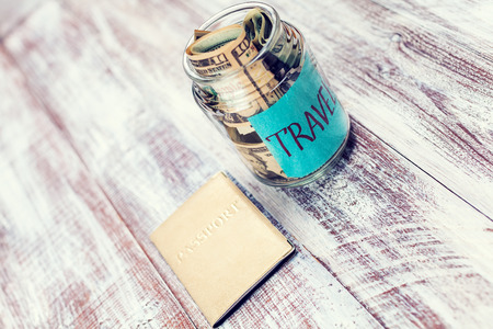 objects for travel isolated on a wooden backgroundの写真素材