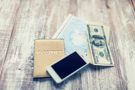 objects for travel isolated on a wooden backgroundの写真素材
