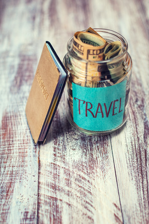 objects for travel isolated on a wooden backgroundの写真素材