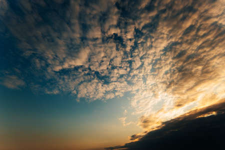 colorful dramatic sky with cloud at sunset.の写真素材