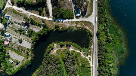 drone with a camera, beautiful summer small river from a height.