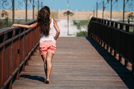 beautiful girl travels in summer to new countries.の写真素材