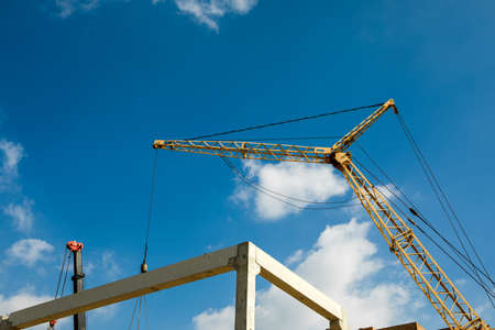 construction site with cranes against the background of new buildings.