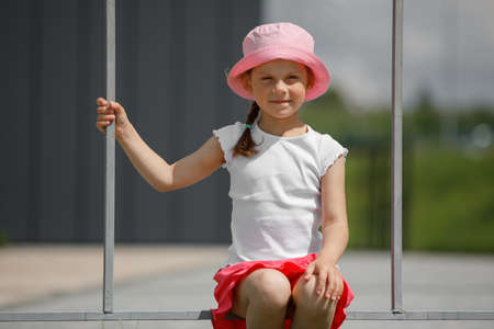 little girl in white t-shirt. space for your design. Mockup for printの写真素材