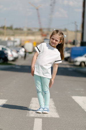 little girl in white t-shirt.の写真素材