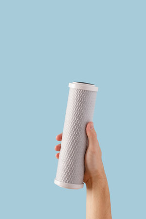 hand water filter. cartridge with a carbon filter of household drinking water purification systems...