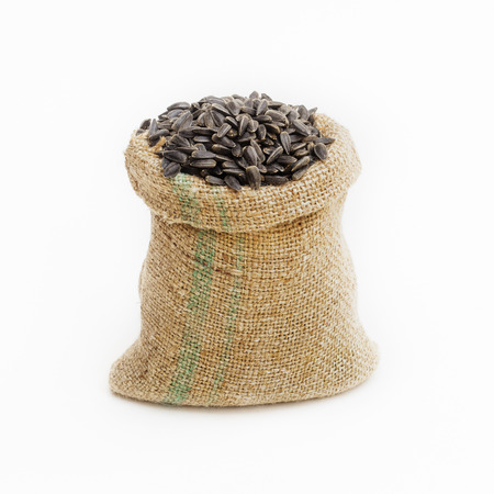 Front shot of a sunflower seeds in a brown canvas bagの写真素材