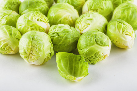 High angle shot of Brussels sprouts on whiteの写真素材