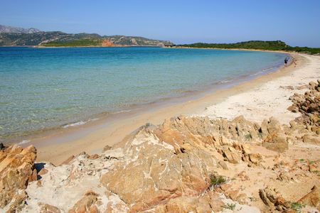 Jogging at Beach of 'Capo Coda Cavallo' - Sardinia - Italyの写真素材