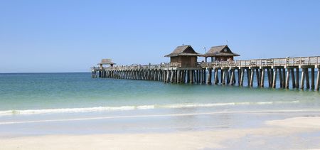 The long pier of caribbean beach of Naples in Florida - USAの写真素材