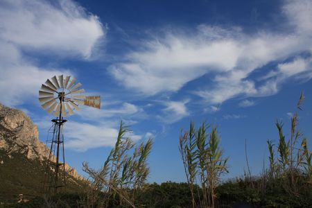 Mill in the countryside with blue skyの写真素材