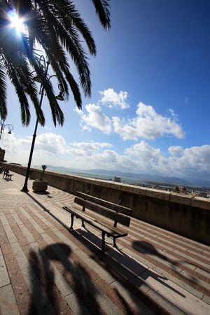 Bench with view in old town of european city