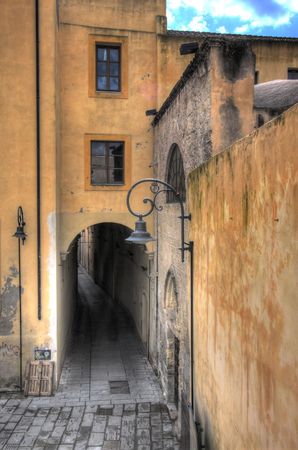 Old medieval street in european cityの写真素材