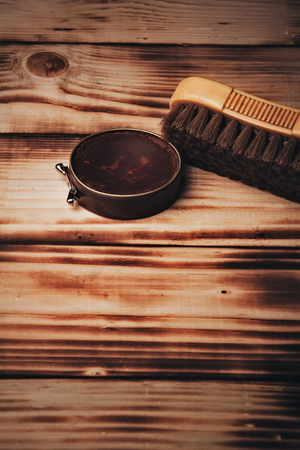 wax and brush.Vintage.Pastel brownwooden backgroundの写真素材