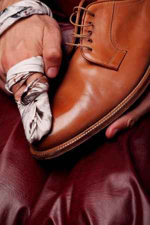 Shoes master polishing shoes with cloth (bull shoes)(Glacage).shoes shining.closeupの写真素材