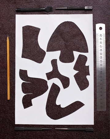 Shoe pattern. Workplace of shoe designer.Copy space.Top viewの写真素材