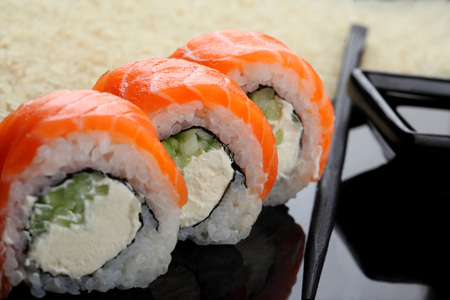 Philadelphia roll sushi with salmon, prawn, avocado, cream cheese. Sushi menu. Japanese food Closeupの写真素材