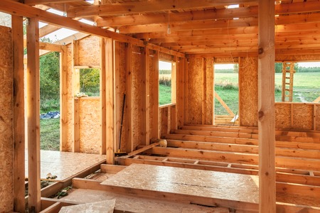 Interior frame house in the process of construction villageの写真素材