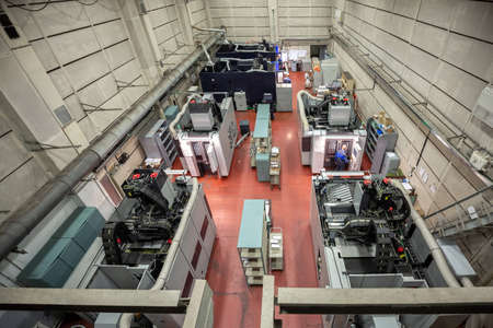 general view of the shop of a metalworking plant with cnc machines