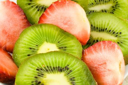 slices of kiwi and strawberryの写真素材