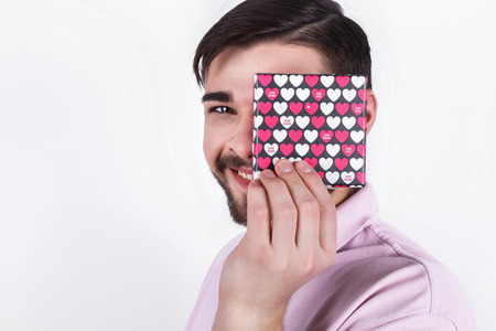 Happy emotional man with gifts on special day