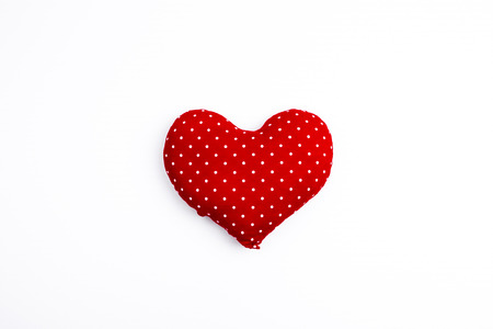 Red valentine heart isolated on whiteの写真素材