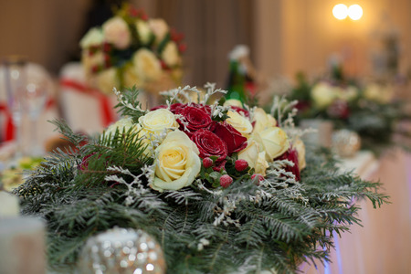 Closeup of white roses wedding bouquet at receptionの写真素材