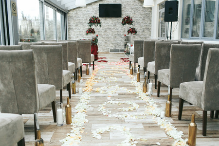 Aisle between chairs prepared for the newlyweds walkの写真素材