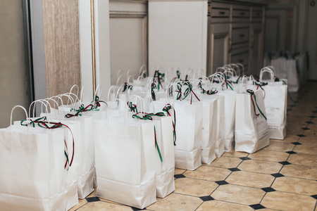 Gifts for the guests in white paper packagesの写真素材