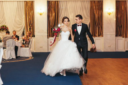 Just married walk to their first danceの写真素材