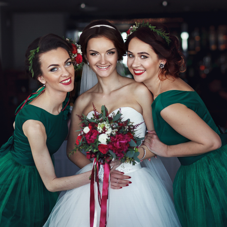 Bridesmaids stand around brideの写真素材