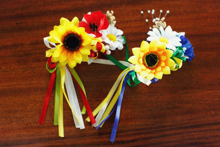 Circlet of sunflowers, chamomile and poppyの写真素材