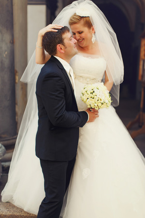 Shine of happiness on newlyweds facesの写真素材