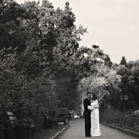 Couple stands on the path in the parkの写真素材