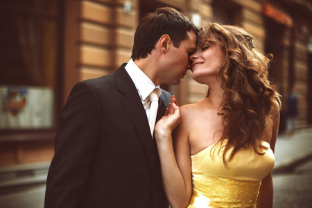 Man and woman touch each other heads tenderの写真素材