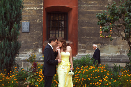 Lady looks with interest at the man in black suitの写真素材