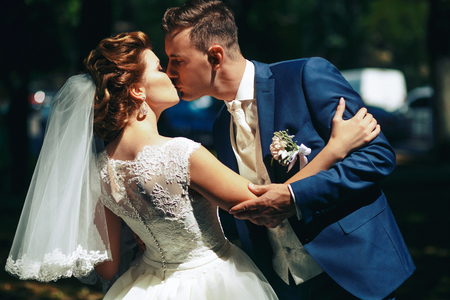 Couple in love kissing in the parkの写真素材