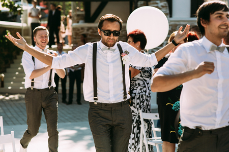 Funny groomsmen on the wedding ceremonyの写真素材