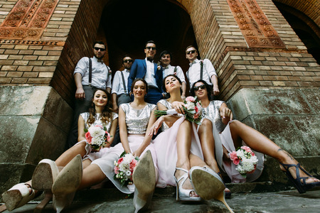 Funny bridesmaids and groomsmen with a groomの写真素材