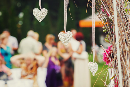White hearts as a part of a wedding altarの写真素材