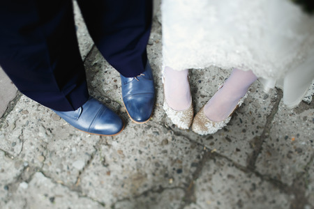 A look from above on newlyweds shoesの写真素材