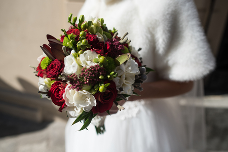 The bride keeps a wedding bouquetの写真素材