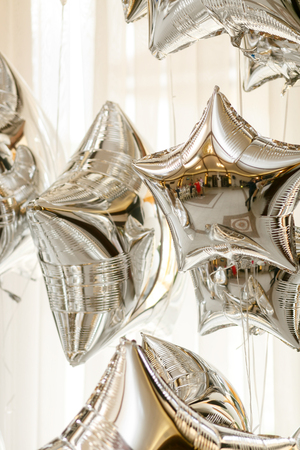 Restaurant hall reflecrs in the silver balloonsの写真素材