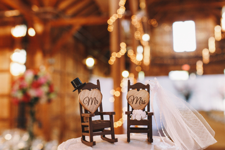 Wedding cake decor made in the for of two rocking chairsの写真素材